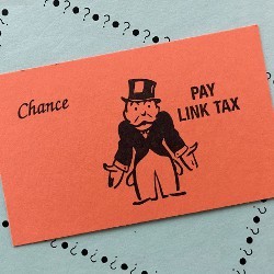 “大富翁机会卡”上写着“支付链接税”